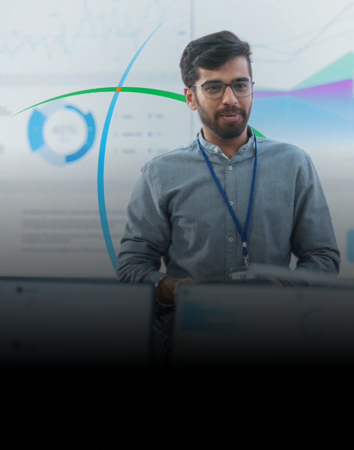 banner showing a man delivering a presentation while standing in front of a large screen displaying analytics-driven insights