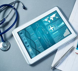 stock-photo-white-tablet-pc-and-doctor-tools-on-gray-surface-530668258 1